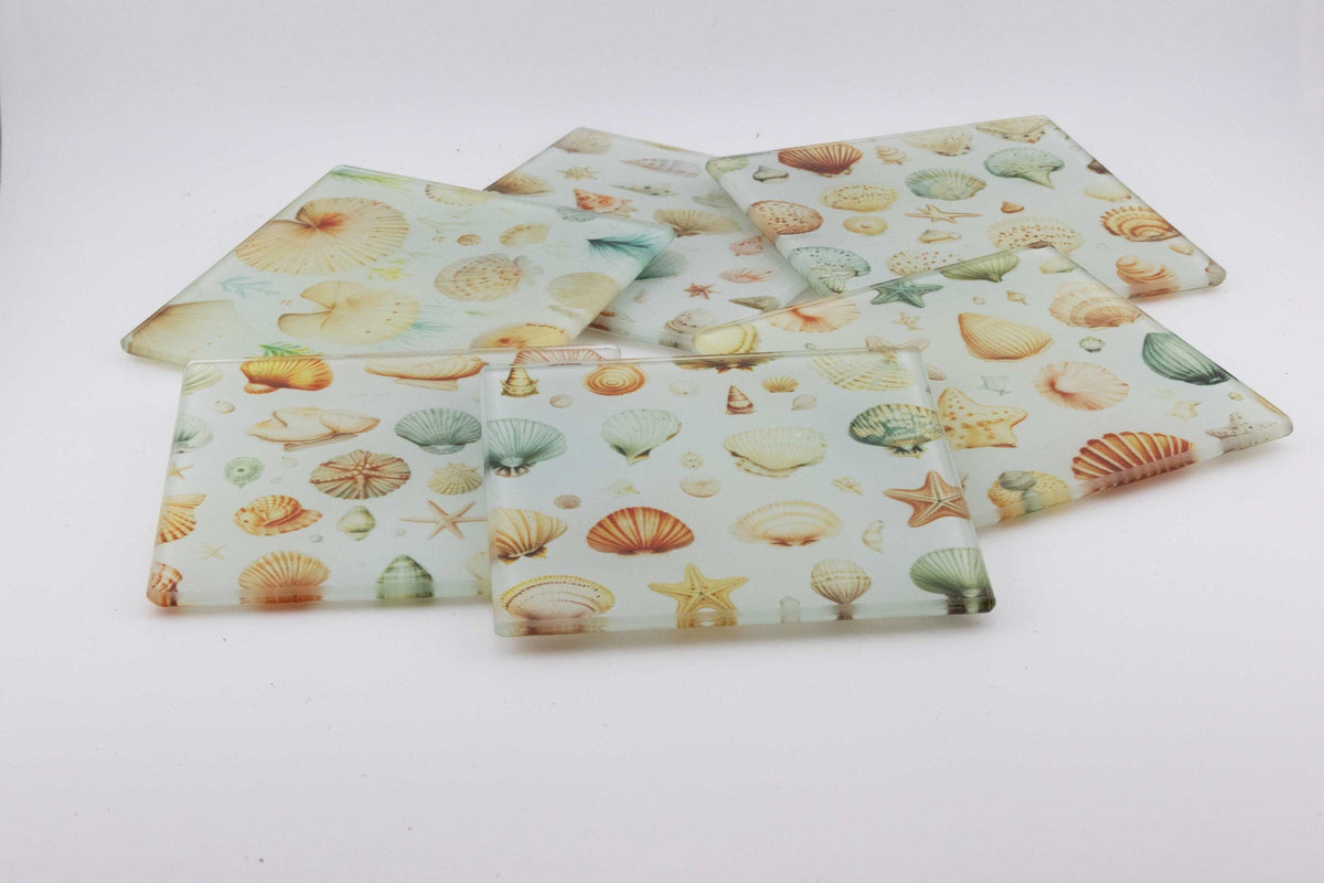 Vintage seashell print square glass coasters with sand and seafoam tones