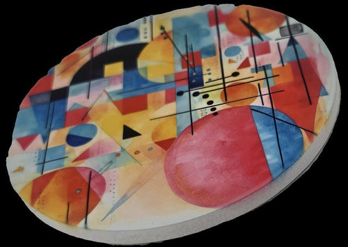 A striking ceramic coaster a colourful abstract geometric design with circles, triangles, squares, adds a bold creative touch to any table.