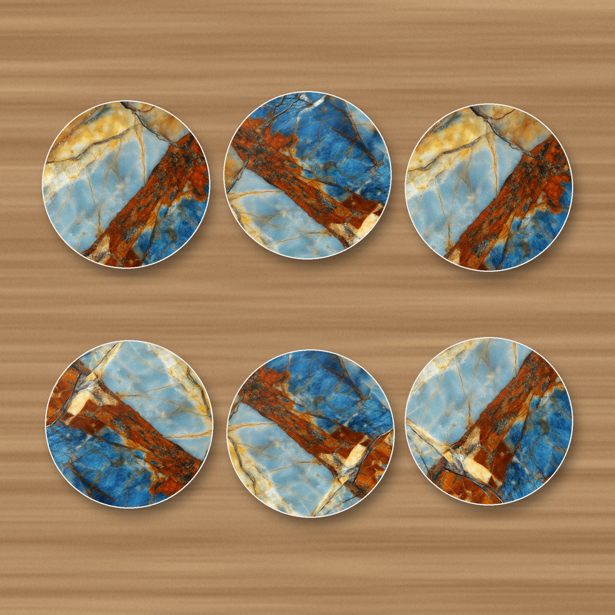 Blue & Copper Marble round ceramic coasters, set of 6, glossy finish, on an oak coffee table