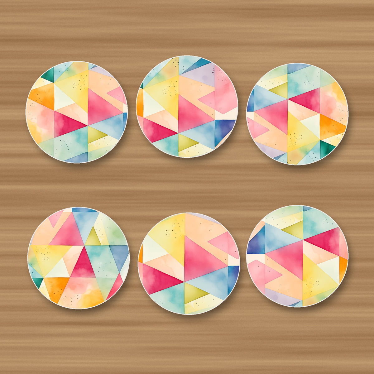 Pastel Harlequin Geometric round ceramic coasters, set of 6, glossy finish, on an oak coffee table