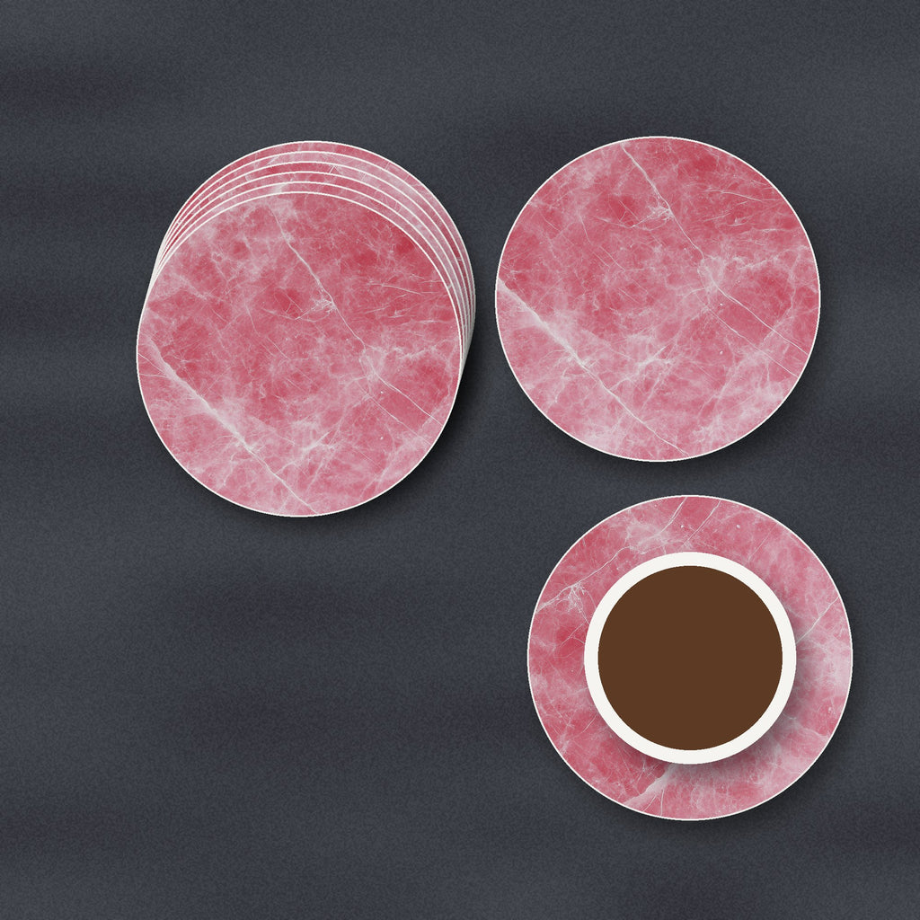 Rose Quartz Pink Marble ceramic coasters, matte finish, stacked on a slate kitchen worktop