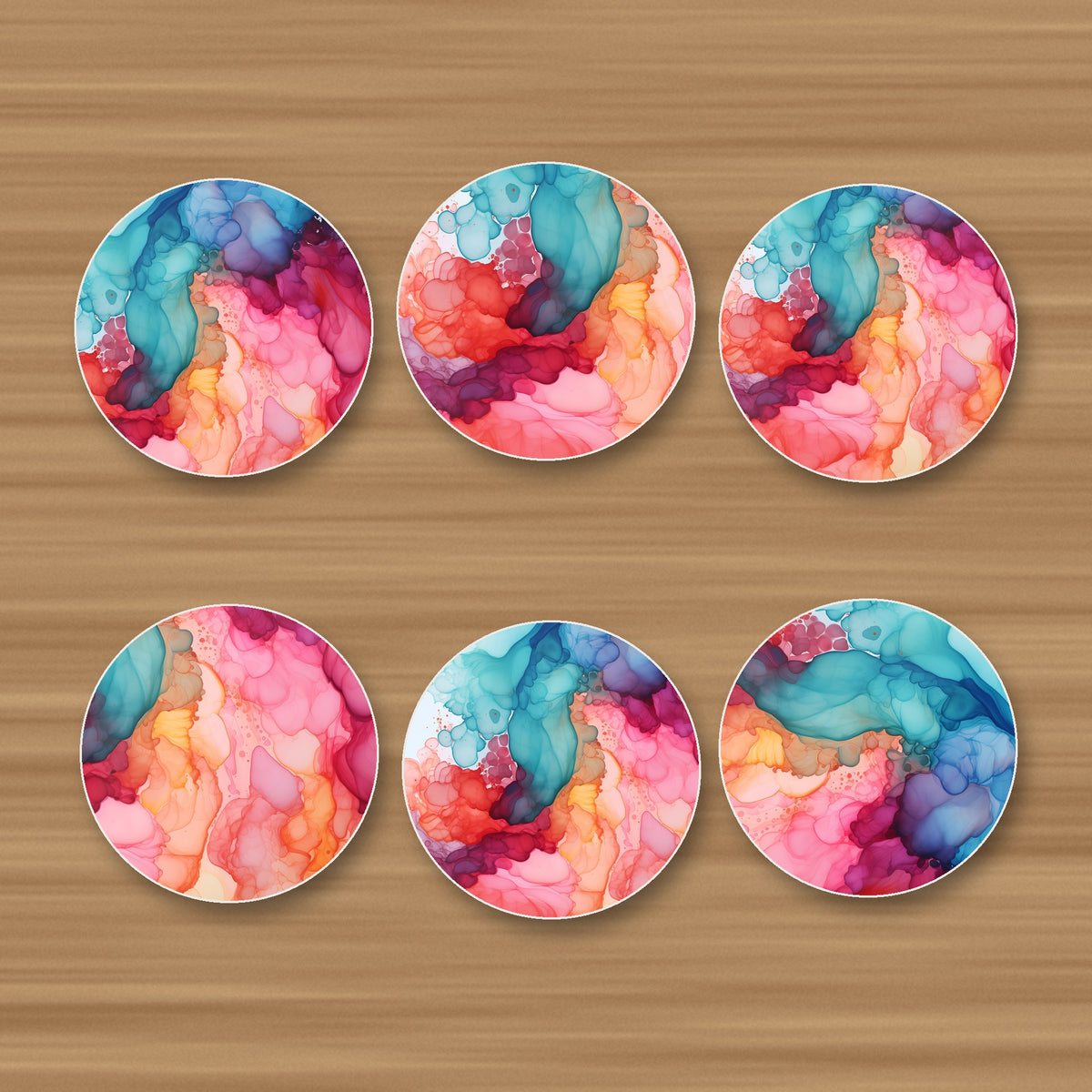 Sunset Alcohol Ink round ceramic coasters, set of 6, glossy finish, on an oak coffee table