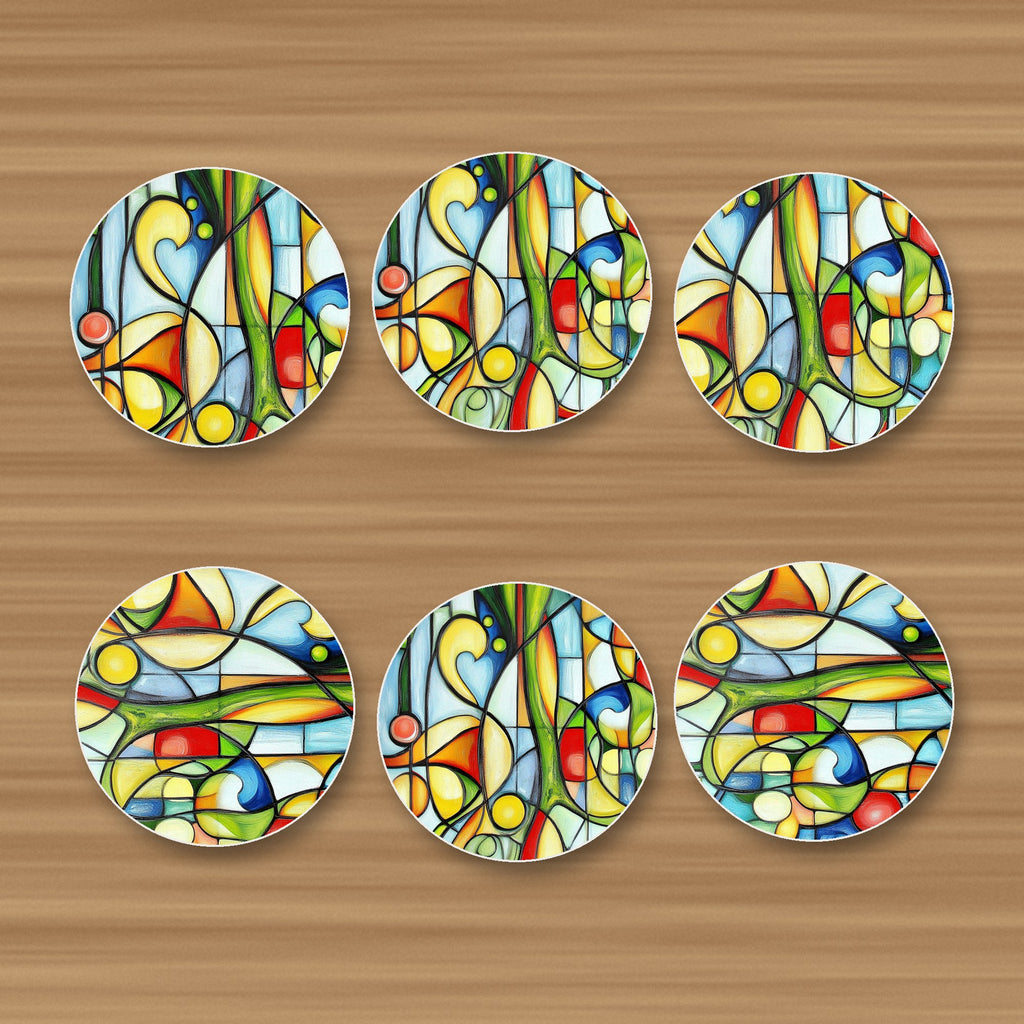 Cubist Garden Abstract round ceramic coasters, set of 6, glossy finish, on an oak coffee table