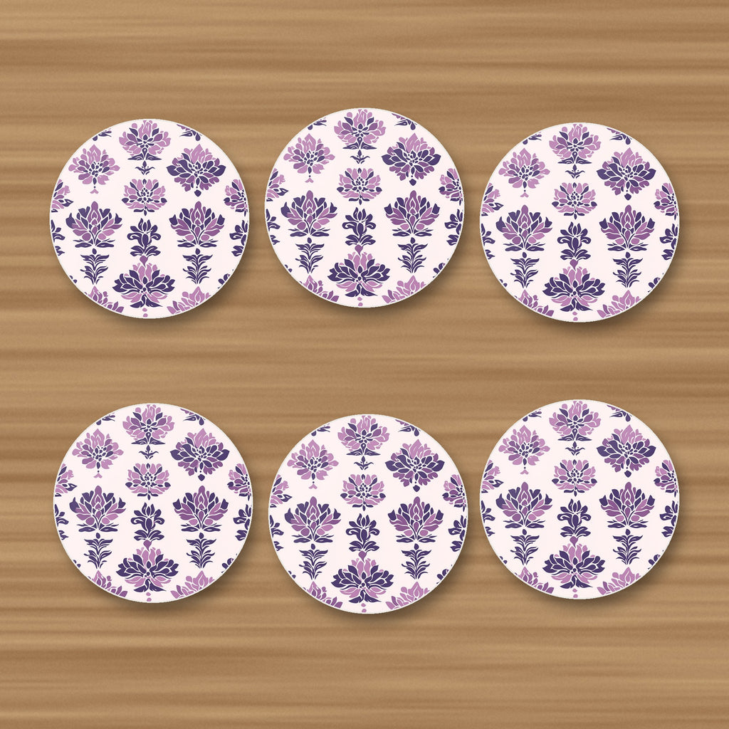 Lilac Damask Pattern round ceramic coasters, set of 6, glossy finish, on an oak coffee table