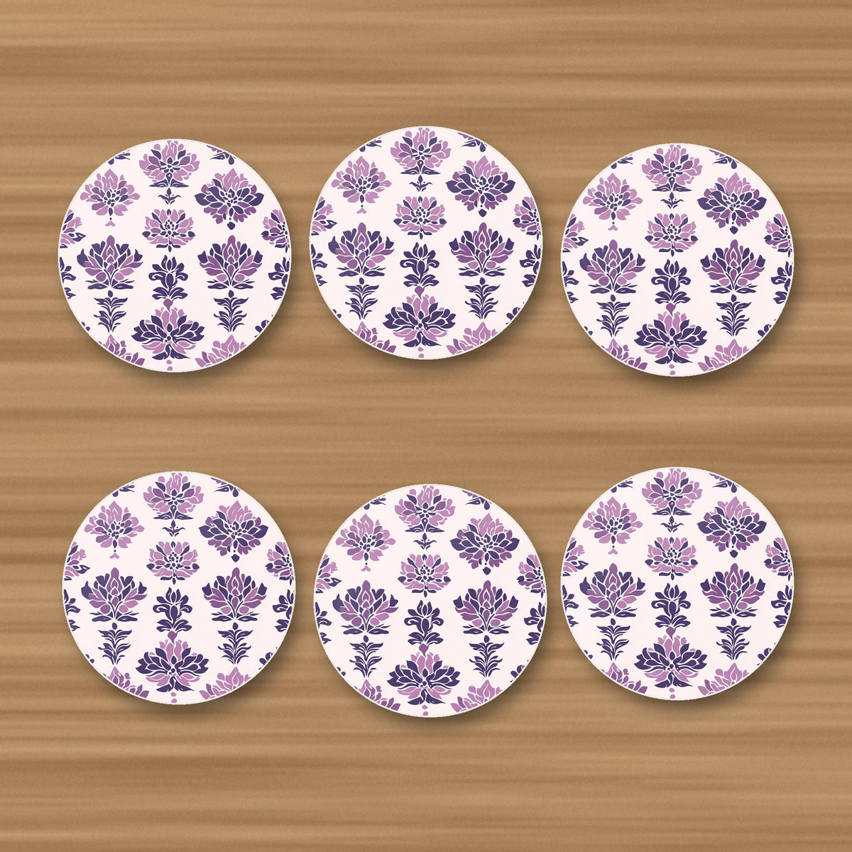 Lilac Damask Pattern round ceramic coasters, set of 6, glossy finish, on an oak coffee table