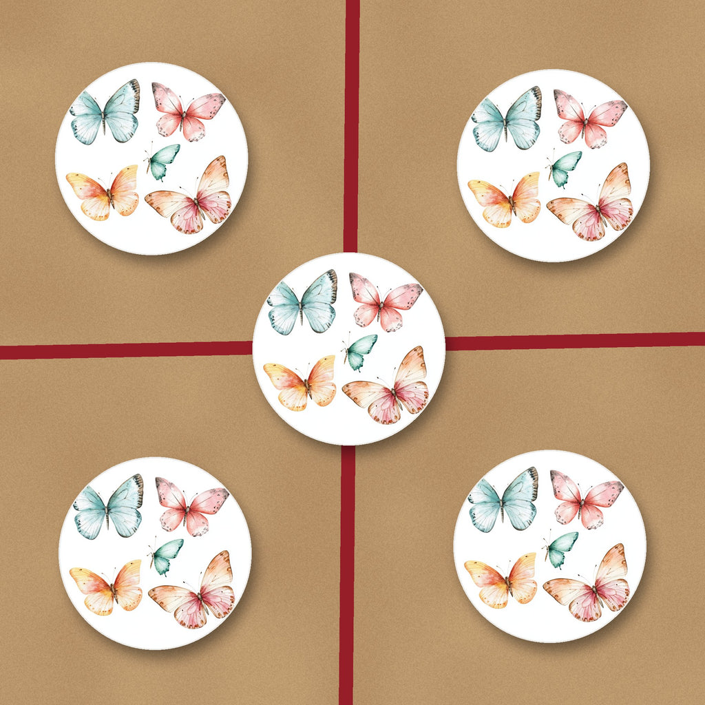 Pastel Butterflies ceramic coasters, glossy finish, on kraft gift wrap