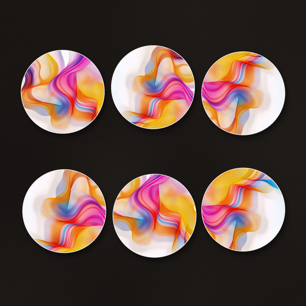 Rainbow Silk Ribbons round ceramic coasters, matte finish, on a dark bar counter