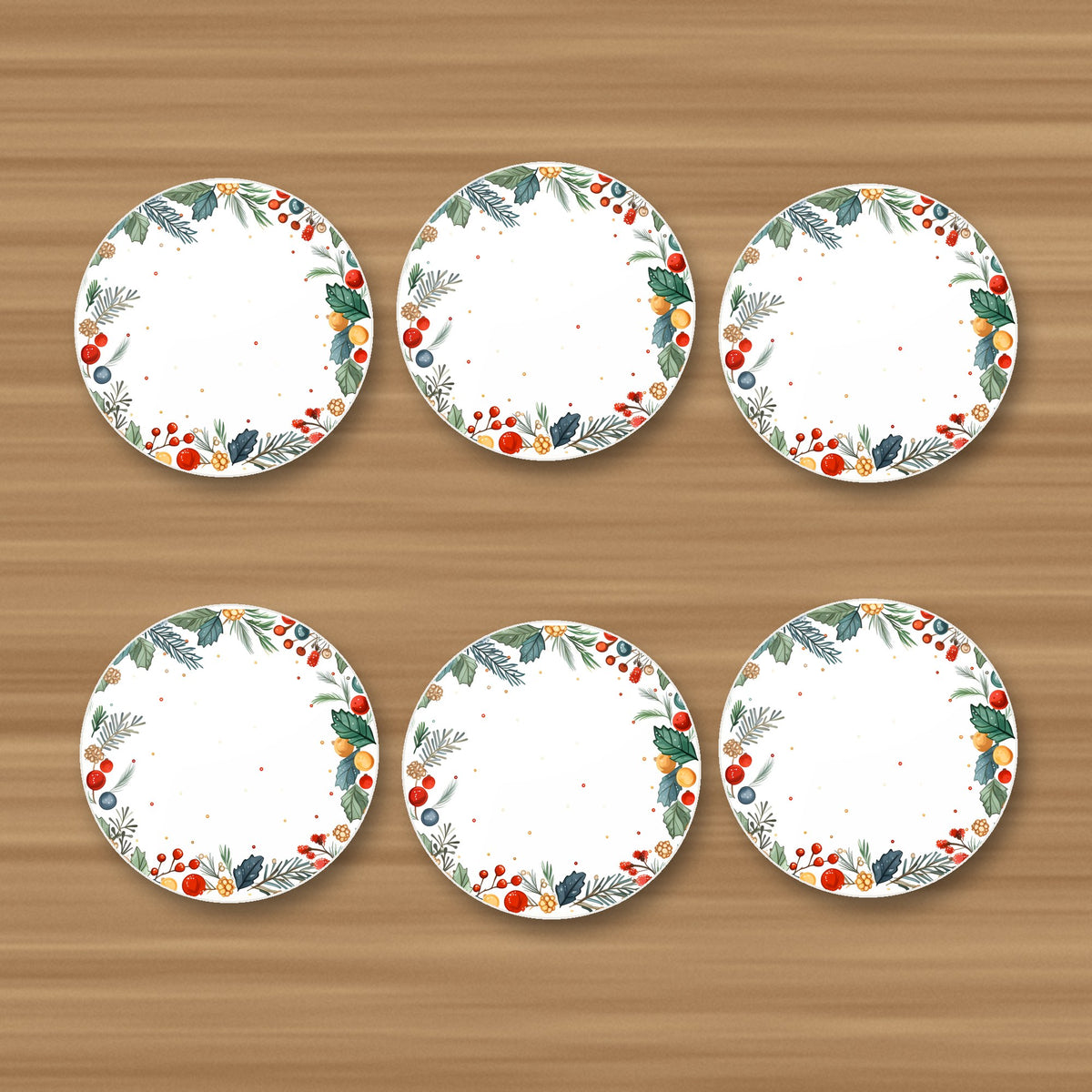 Holly & Berry Wreath round ceramic coasters, set of 6, glossy finish, on an oak coffee table