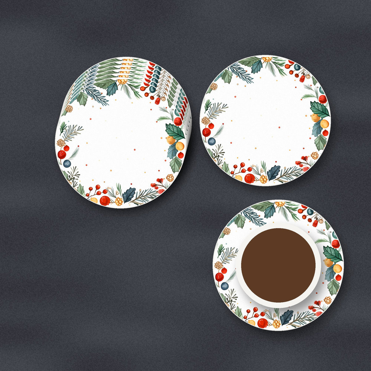 Holly & Berry Wreath ceramic coasters, matte finish, stacked on a slate kitchen worktop
