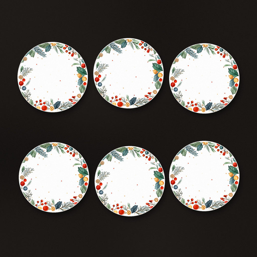 Holly & Berry Wreath round ceramic coasters, matte finish, on a dark bar counter