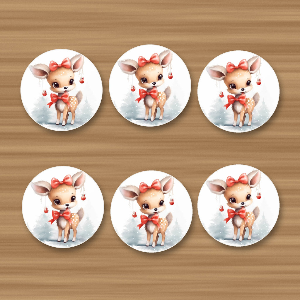 Christmas Fawn round ceramic coasters, set of 6, glossy finish, on an oak coffee table