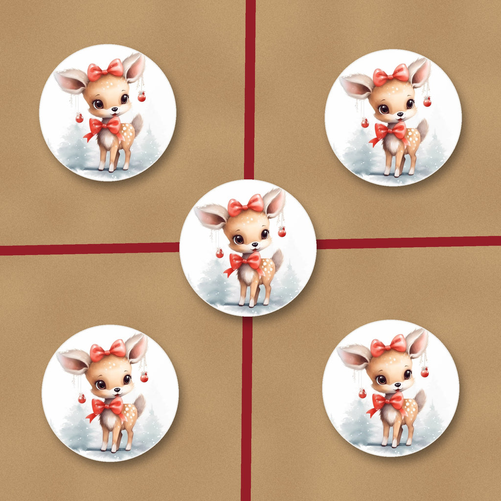 Christmas Fawn ceramic coasters, glossy finish, on kraft gift wrap