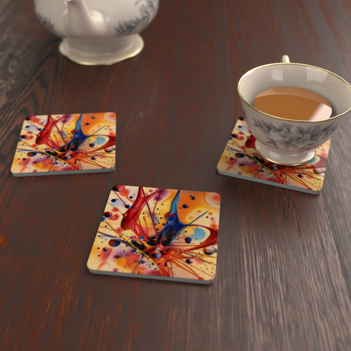 Acrylic Oil Splash No.5 square glass coasters on a kitchen table with a teacup – lifestyle mockup 2