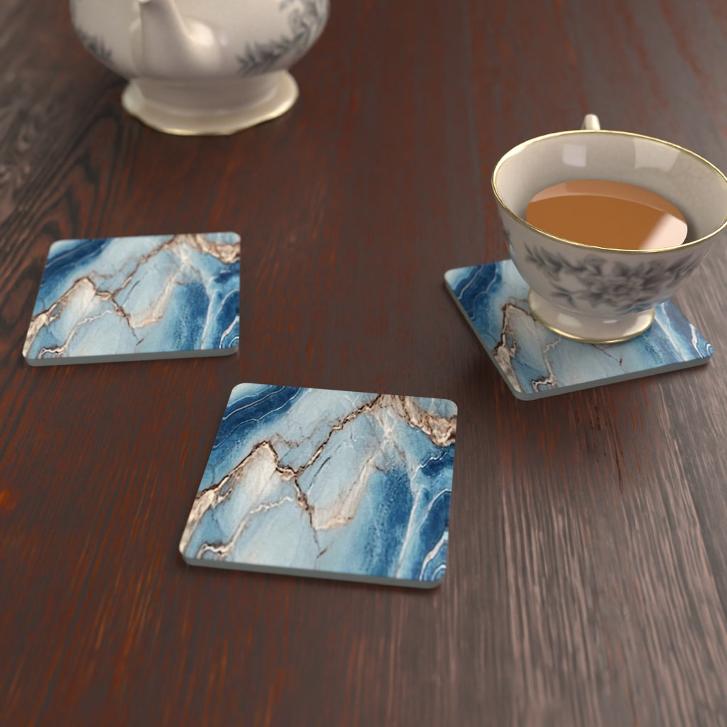 Cyan, Blue & Gold Marble square glass coasters on a kitchen table with a teacup – lifestyle mockup 2
