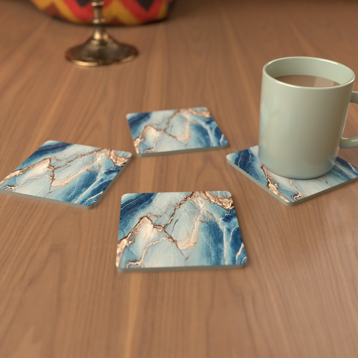 Cyan, Blue & Gold Marble square glass coasters set out in a cosy living room – lifestyle mockup 3