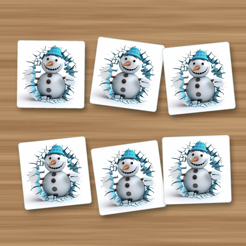 3D Snowman Breaking Through Ice square glass coasters, set of 6, on an oak coffee table