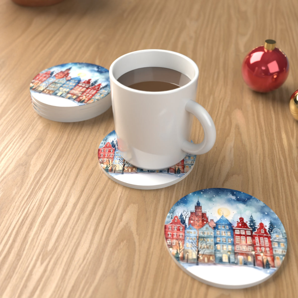 Watercolour Christmas Town Round Ceramic Coasters – Set of 6 – lifestyle mockup with a mug of coffee