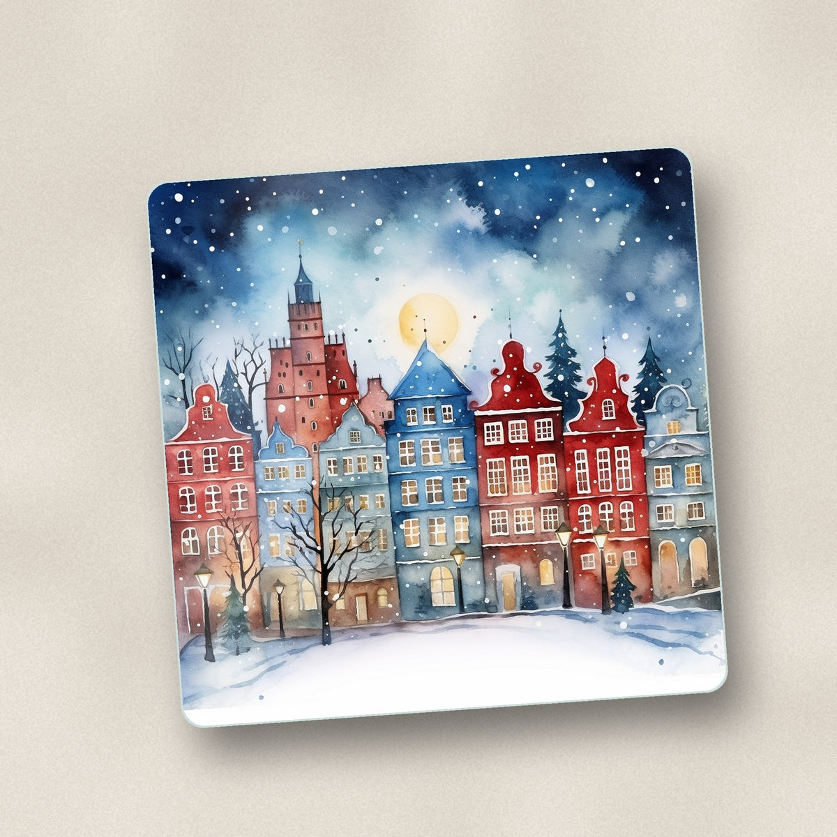 Close-up of one watercolour christmas town square glass coaster, flat UV print