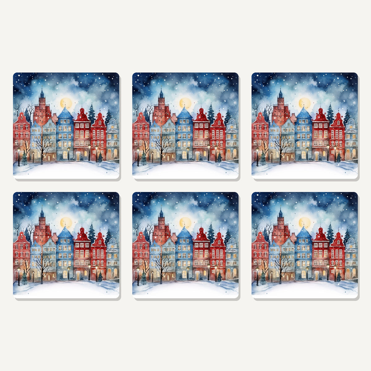 Flat lay of the watercolour christmas town artwork on six square coasters