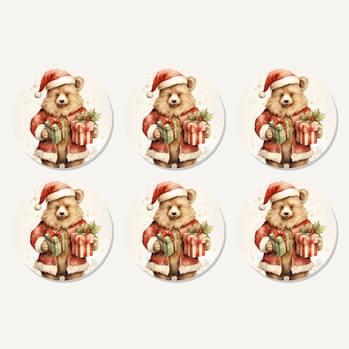 Flat lay of the christmas teddy with gifts artwork on six round coasters