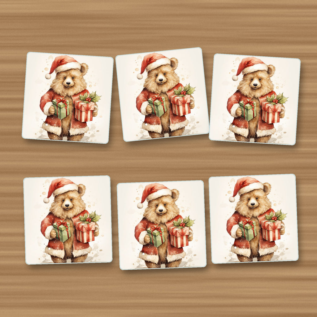 Christmas Teddy with Gifts square glass coasters, set of 6, on an oak coffee table
