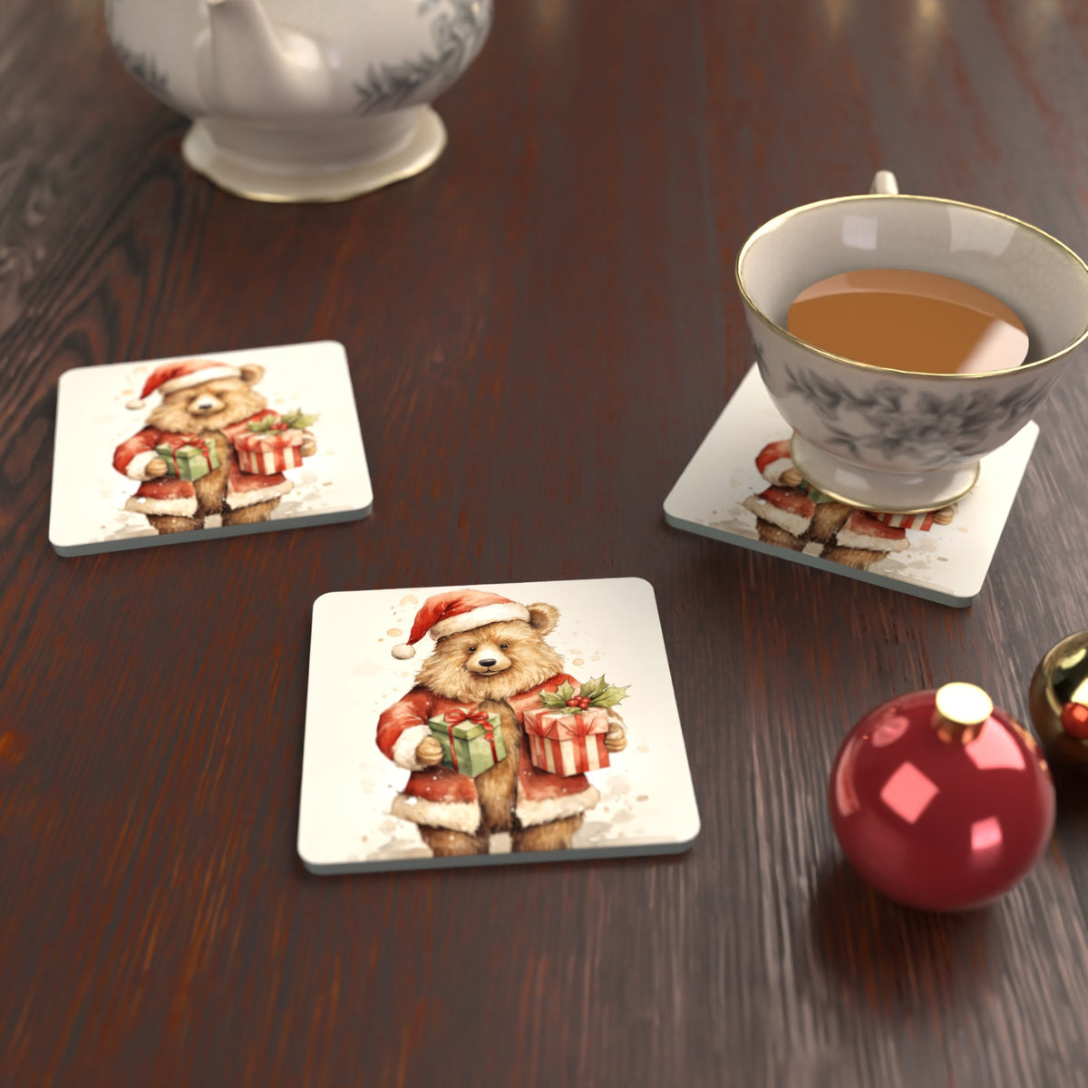 Christmas Teddy with Gifts Square Glass Coasters – Set of 6 – lifestyle mockup with a teacup