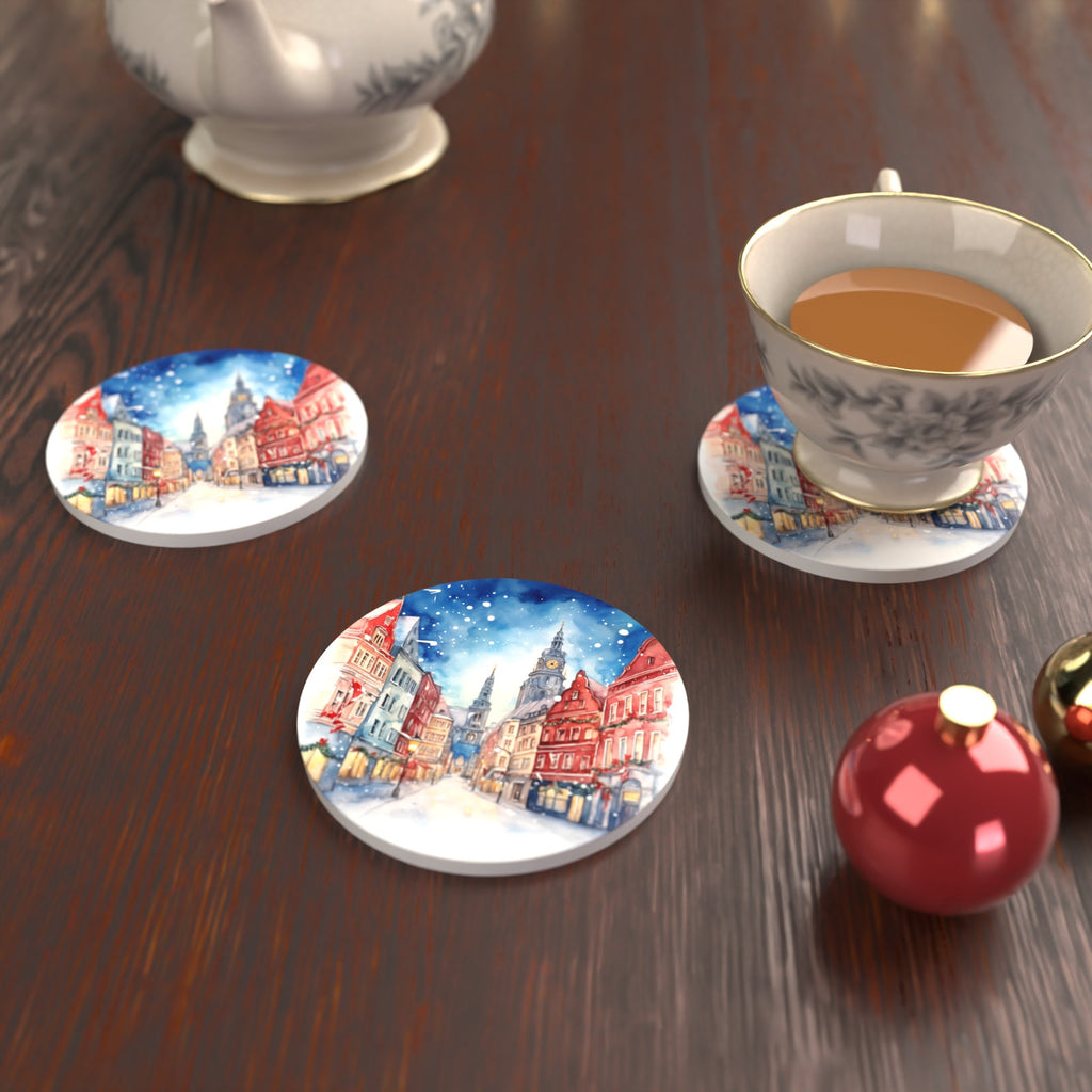 Snowy Christmas Street Watercolour Round Ceramic Coasters – Set of 6 – lifestyle mockup with a teacup