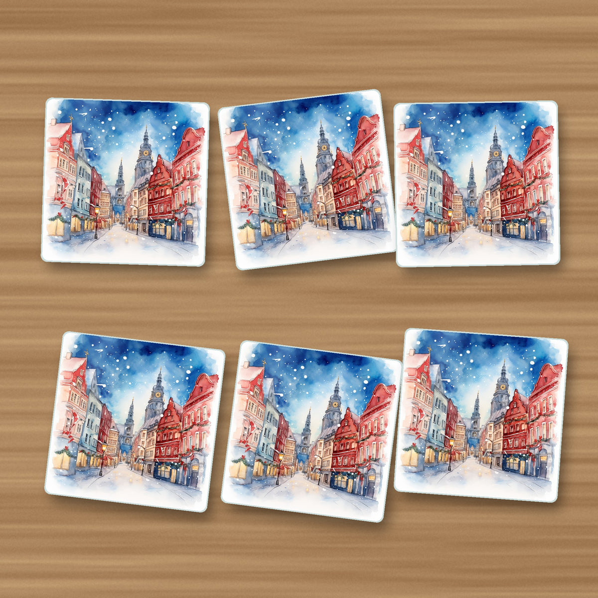Snowy Christmas Street Watercolour square glass coasters, set of 6, on an oak coffee table