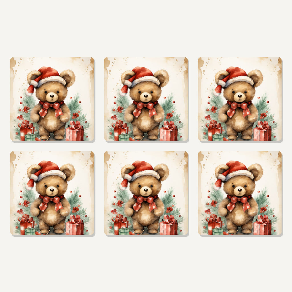 Flat lay of the christmas teddy in santa hat artwork on six square coasters