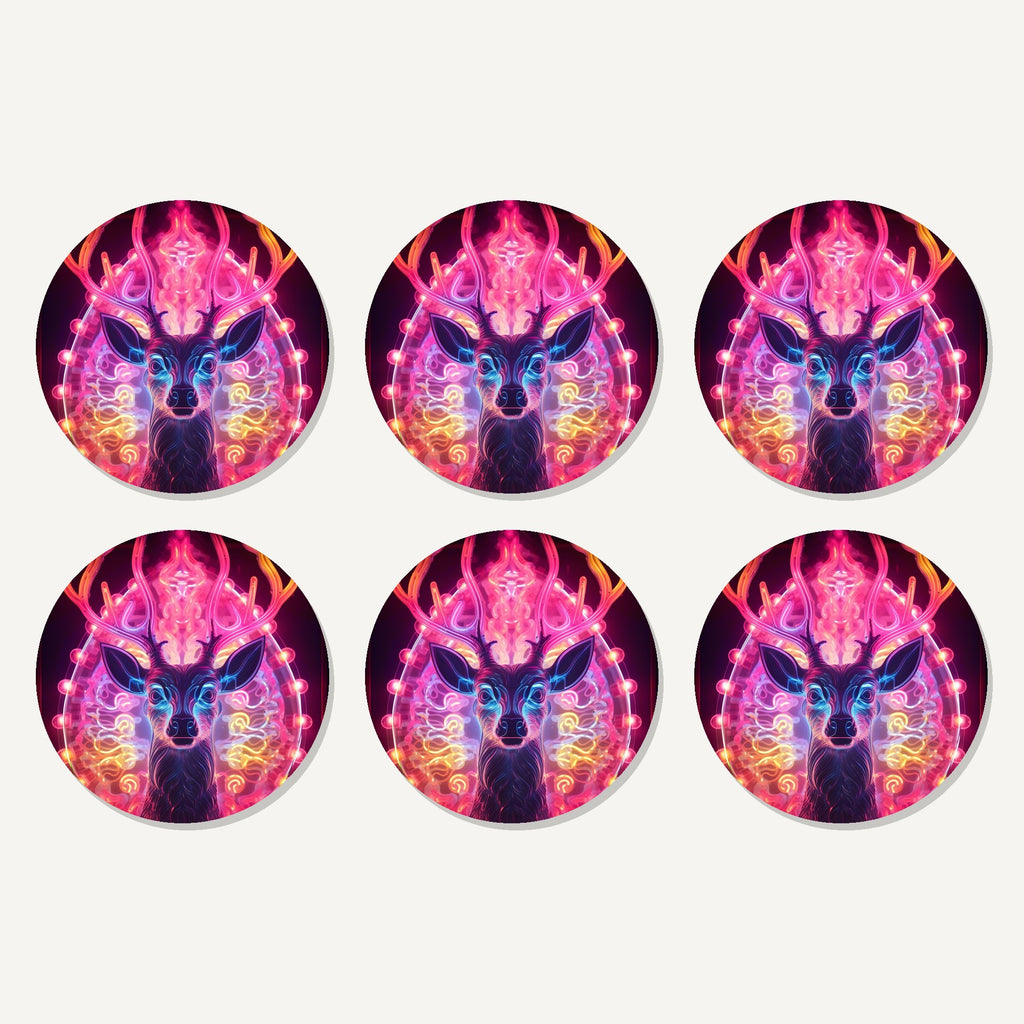 Flat lay of the neon glow stag artwork on six round coasters