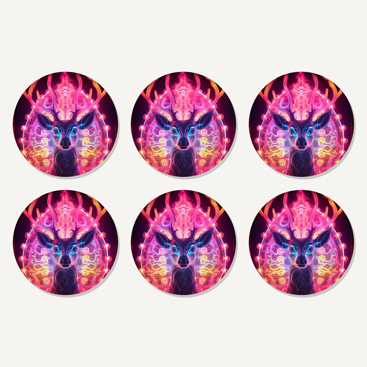 Flat lay of the neon glow stag artwork on six round coasters