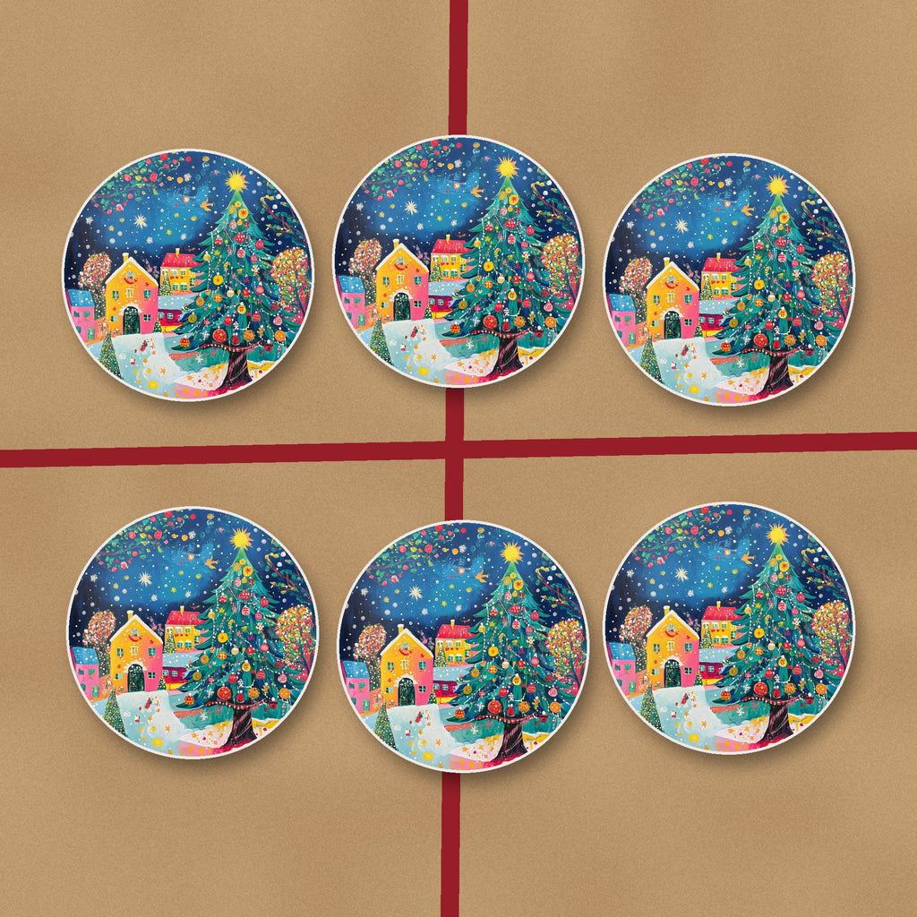 Folk Art Christmas Tree Village round ceramic coasters on kraft gift wrap