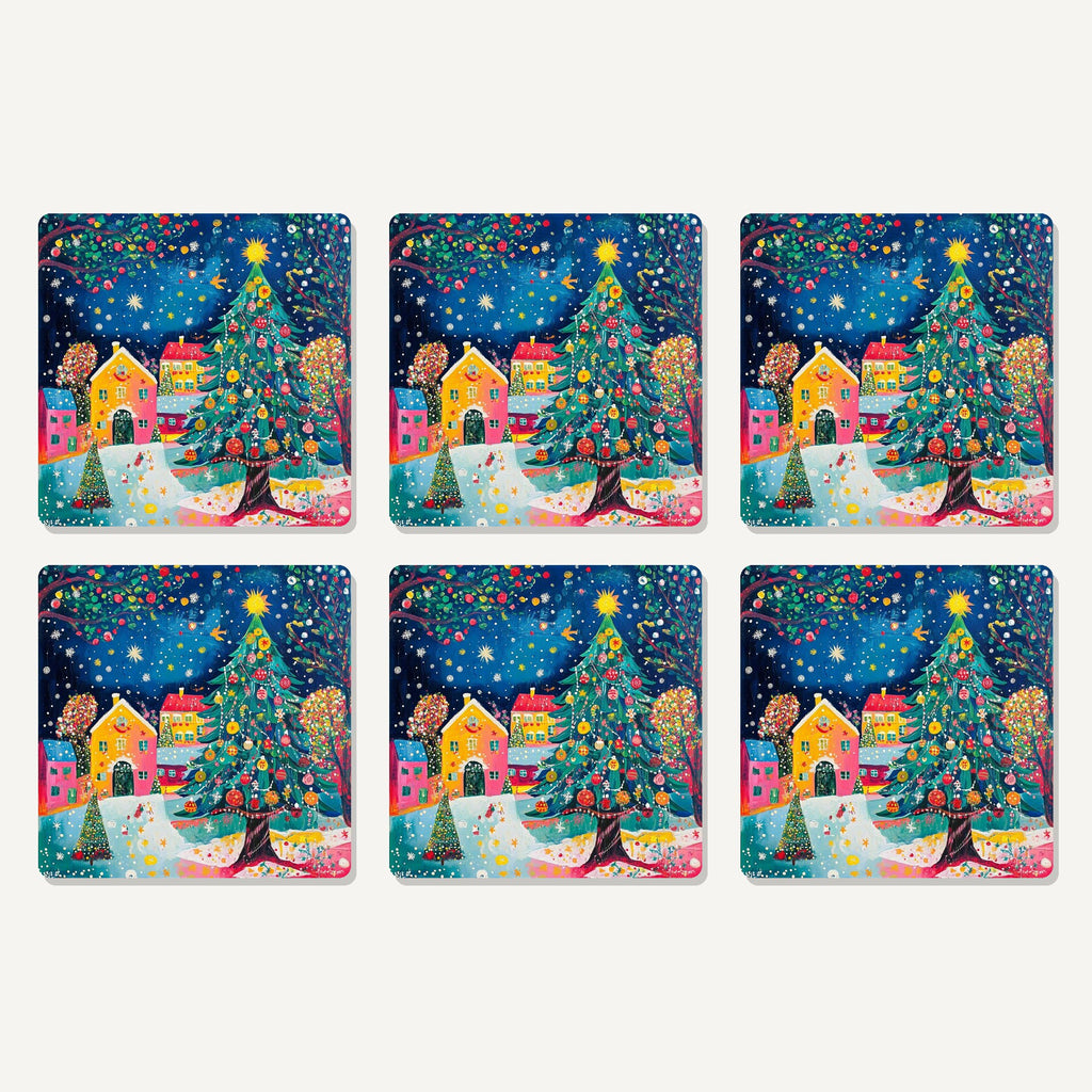 Flat lay of the folk art christmas tree village artwork on six square coasters