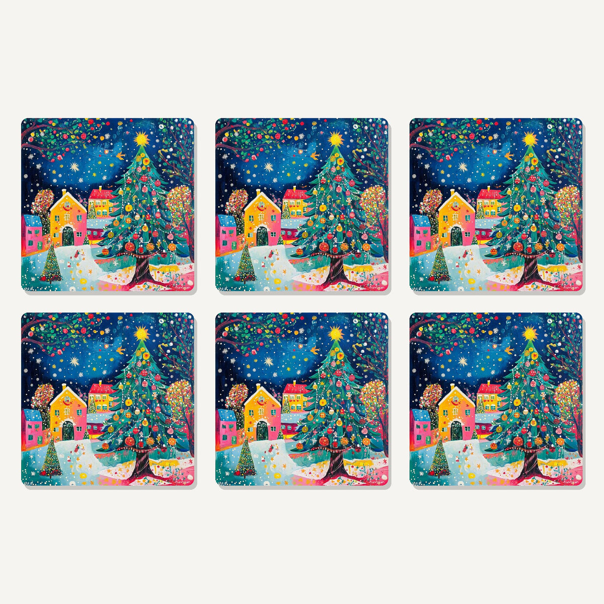 Flat lay of the folk art christmas tree village artwork on six square coasters