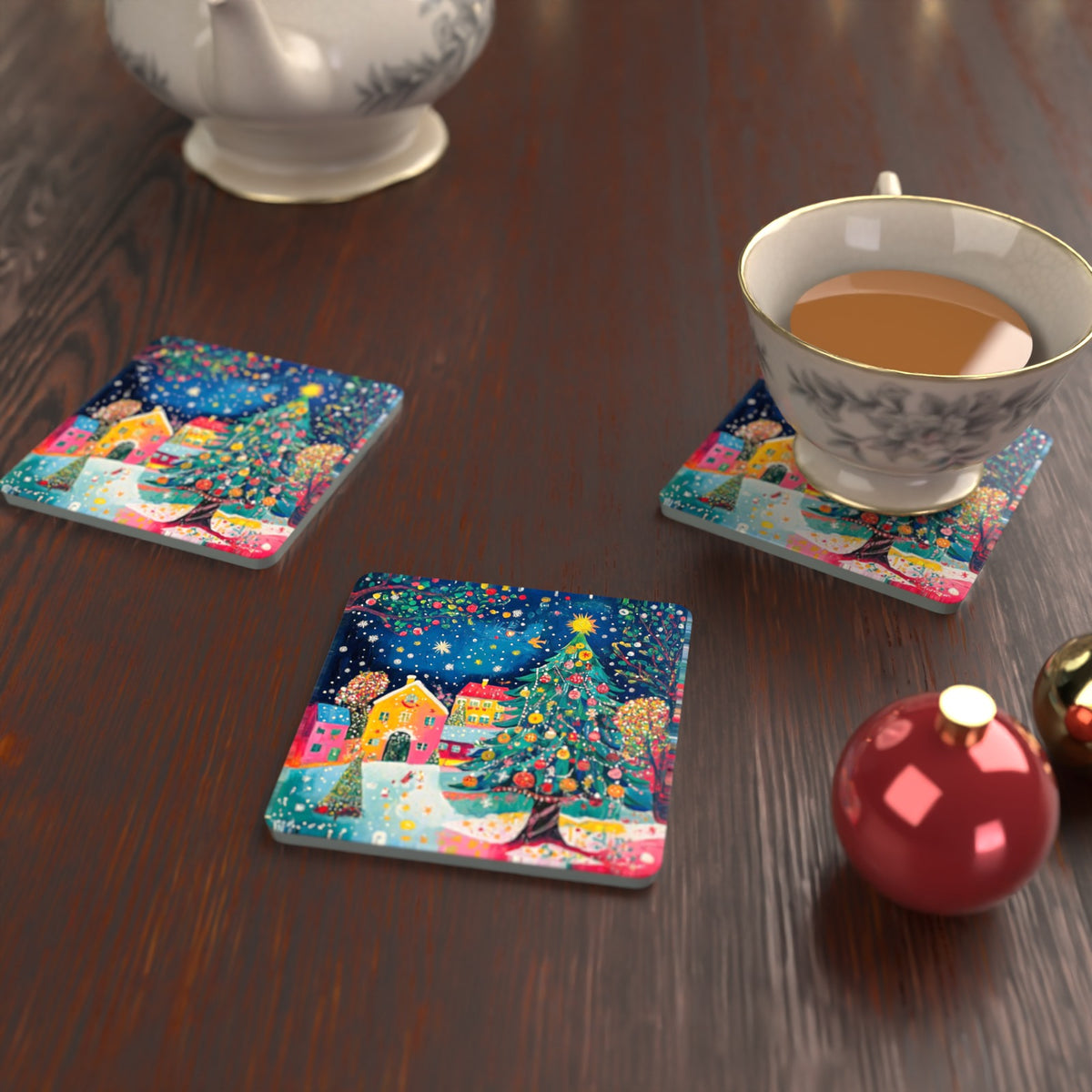 Folk Art Christmas Tree Village Square Glass Coasters – Set of 6 – lifestyle mockup with a teacup