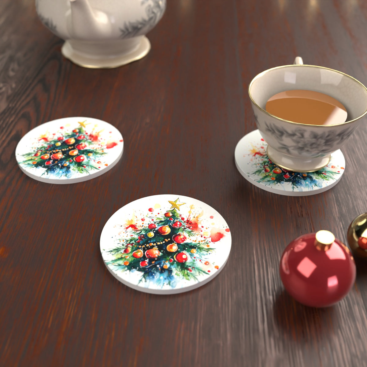 Watercolour Christmas Tree with Red Baubles Round Ceramic Coasters – Set of 6 – lifestyle mockup with a teacup