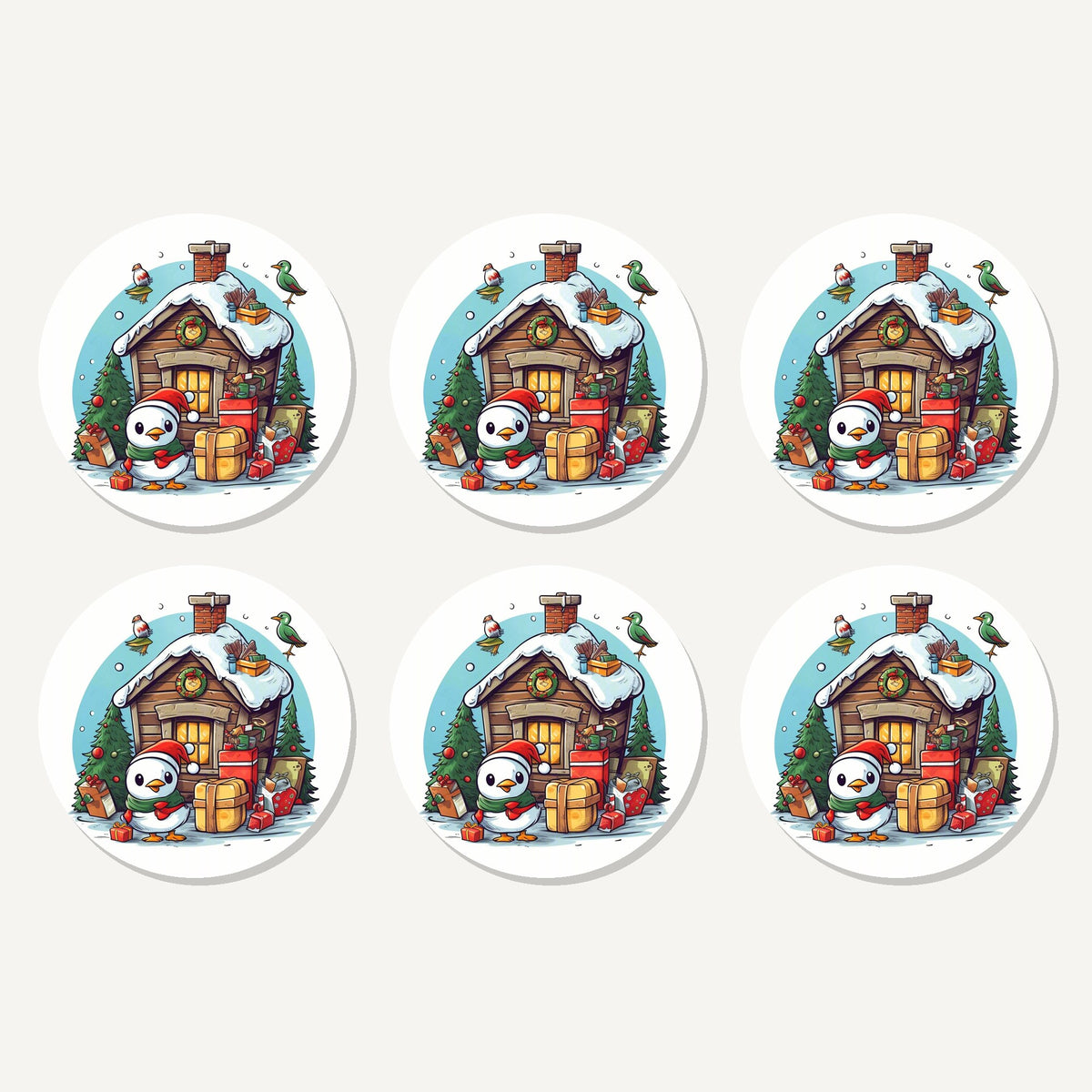Flat lay of the christmas cabin with penguin artwork on six round coasters