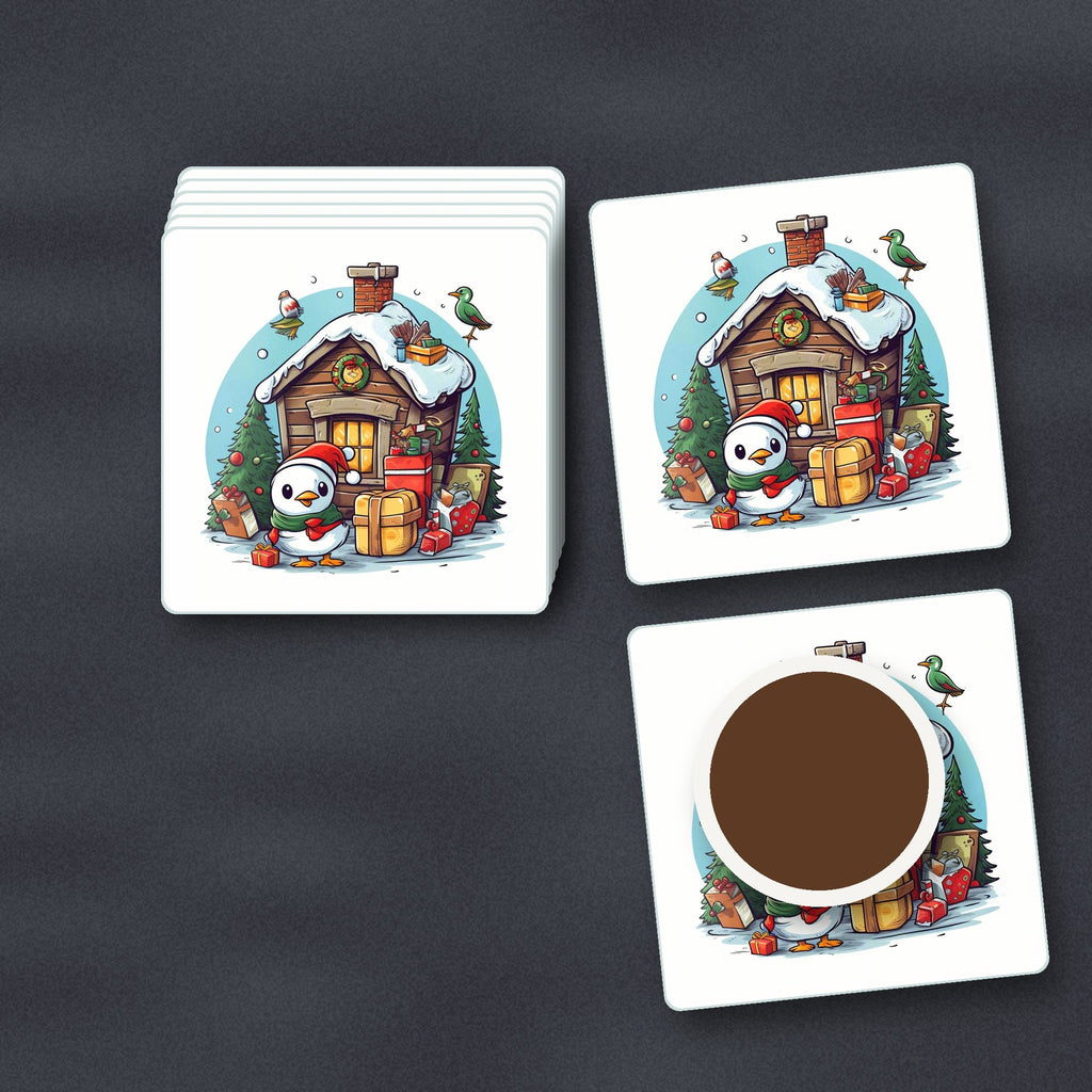Christmas Cabin with Penguin square glass coasters stacked on a slate kitchen worktop
