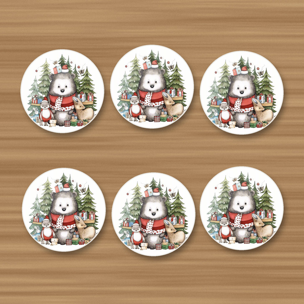 Christmas Woodland Friends round ceramic coasters, set of 6, on an oak coffee table