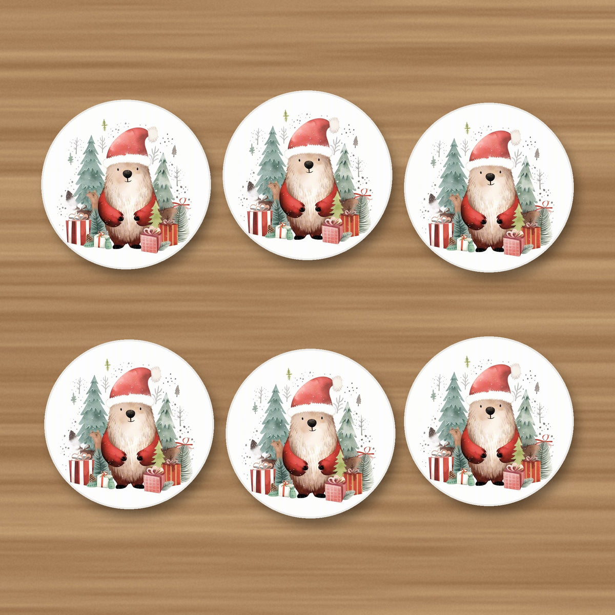 Christmas Bear in Santa Hat round ceramic coasters, set of 6, on an oak coffee table