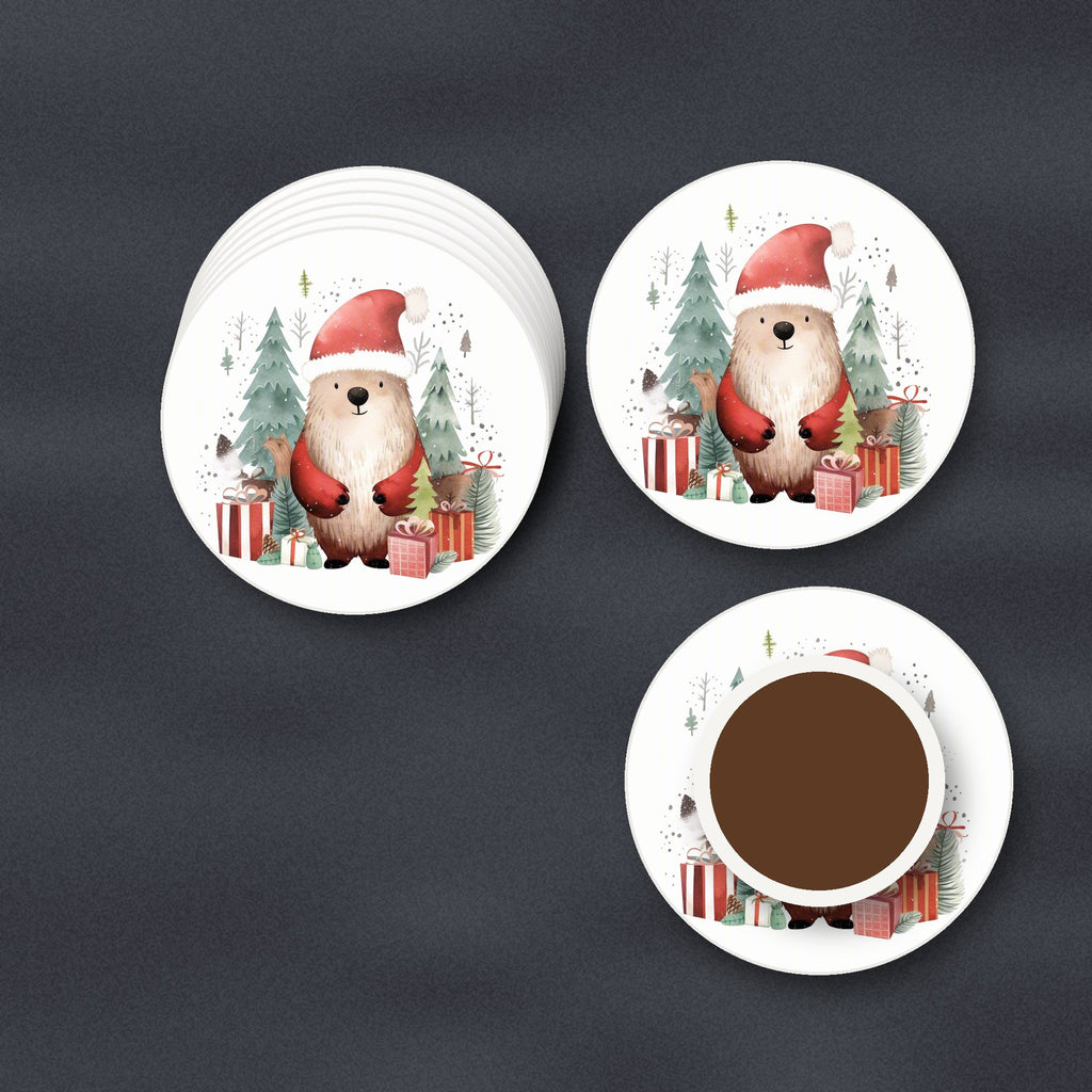 Christmas Bear in Santa Hat round ceramic coasters stacked on a slate kitchen worktop
