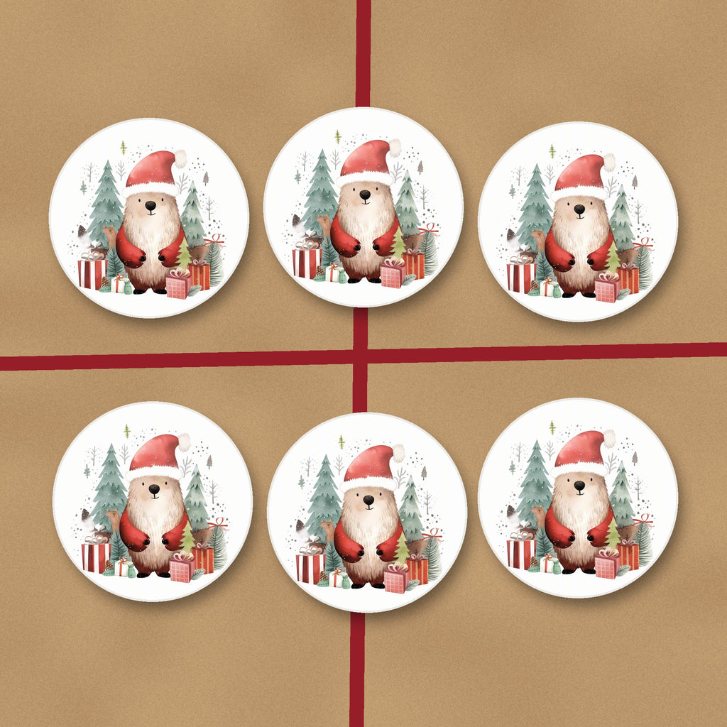 Christmas Bear in Santa Hat round ceramic coasters on kraft gift wrap