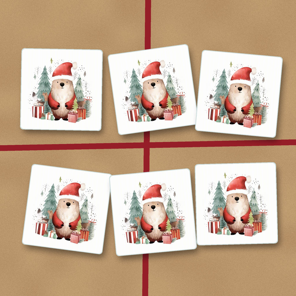 Christmas Bear in Santa Hat square glass coasters on kraft gift wrap