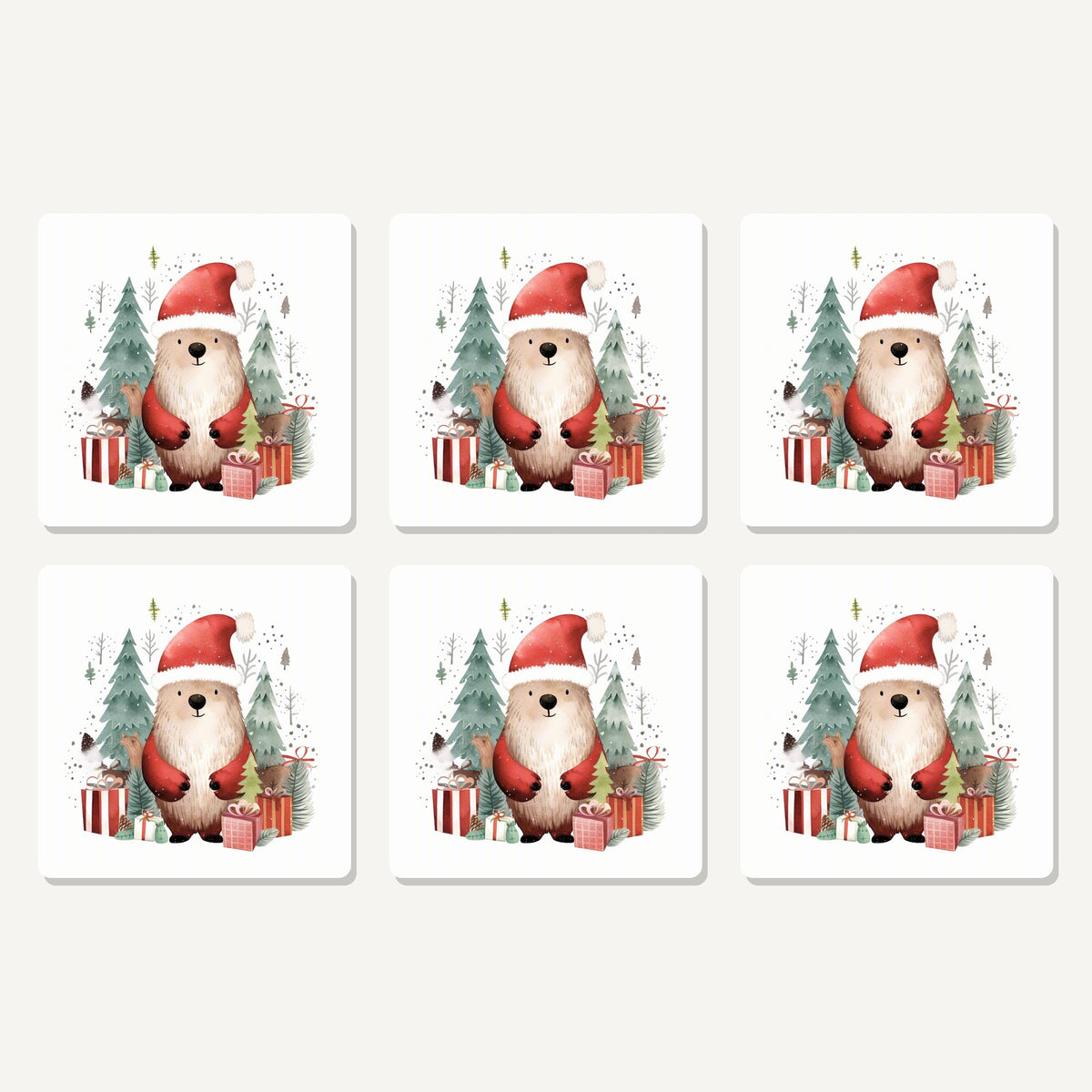 Flat lay of the christmas bear in santa hat artwork on six square coasters