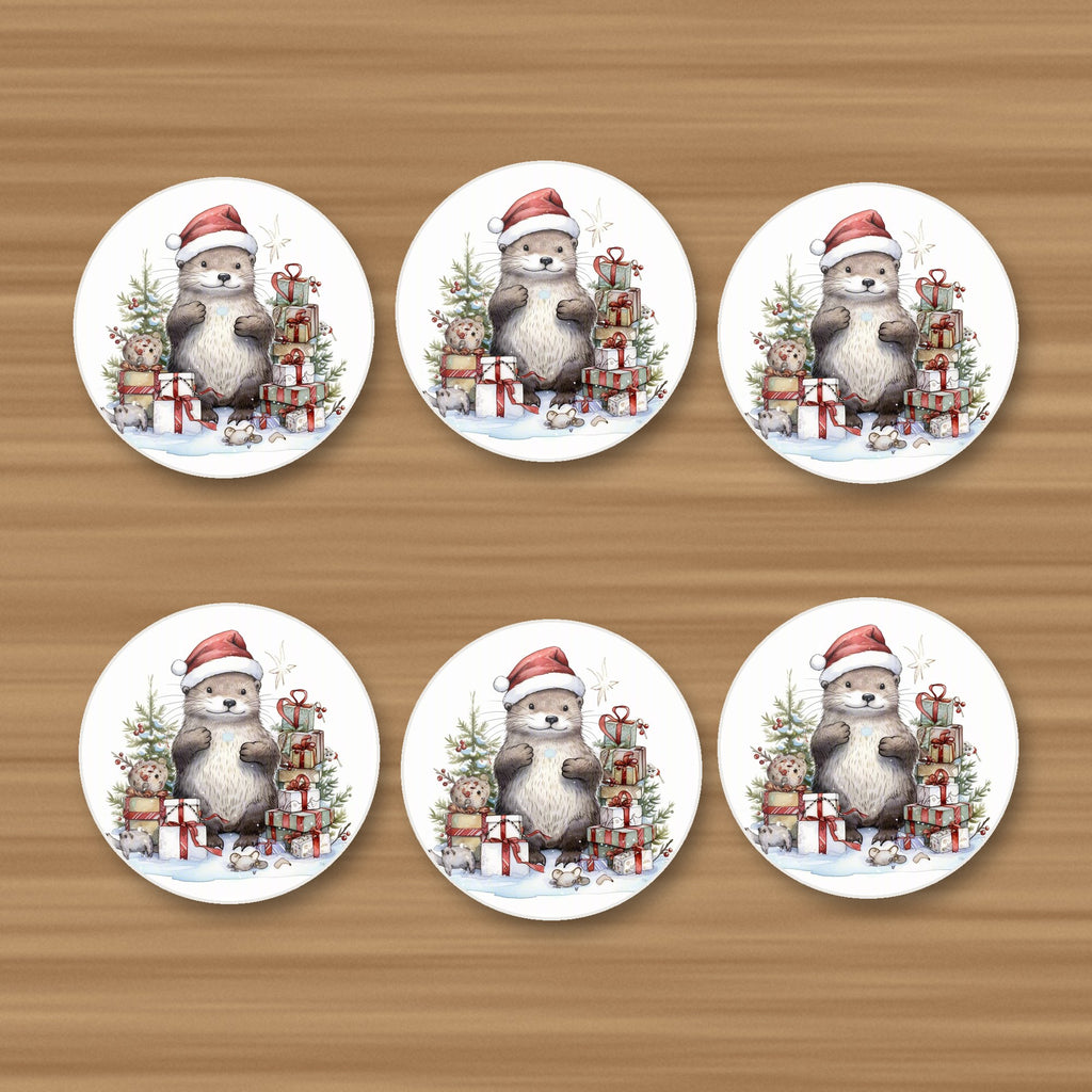 Christmas Otter with Gifts round ceramic coasters, set of 6, on an oak coffee table