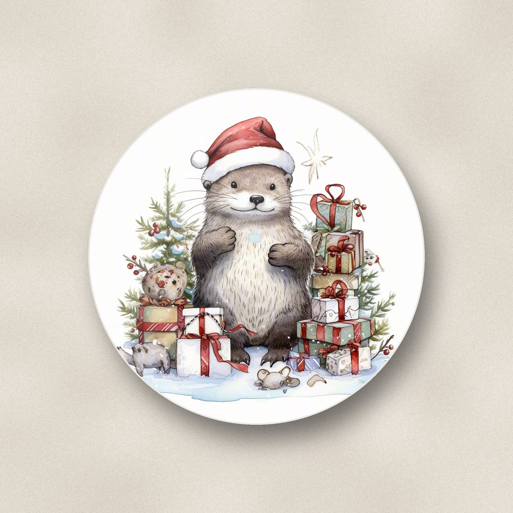 Close-up of one christmas otter with gifts round ceramic coaster, flat UV print