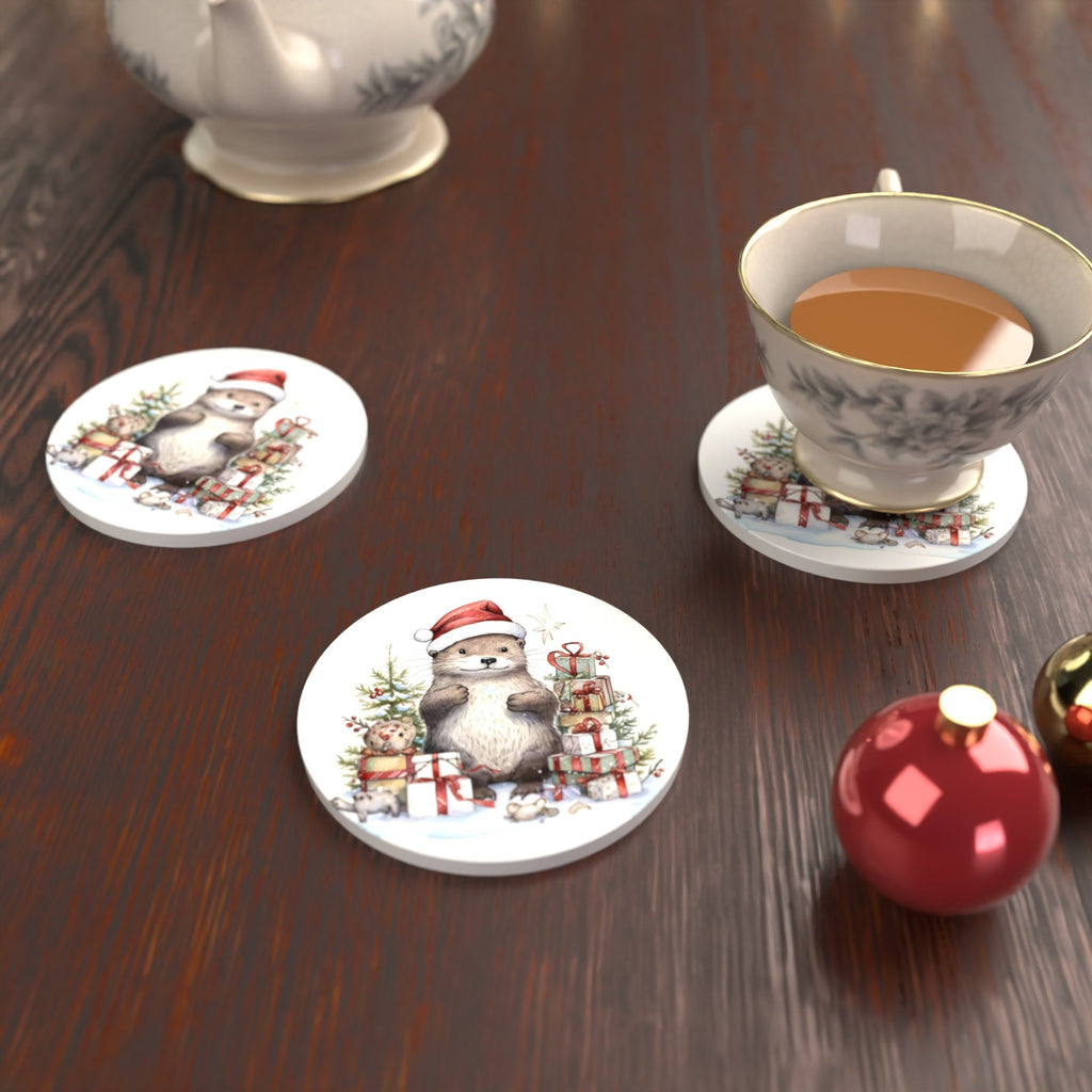 Christmas Otter with Gifts Round Ceramic Coasters – Set of 6 – lifestyle mockup with a teacup