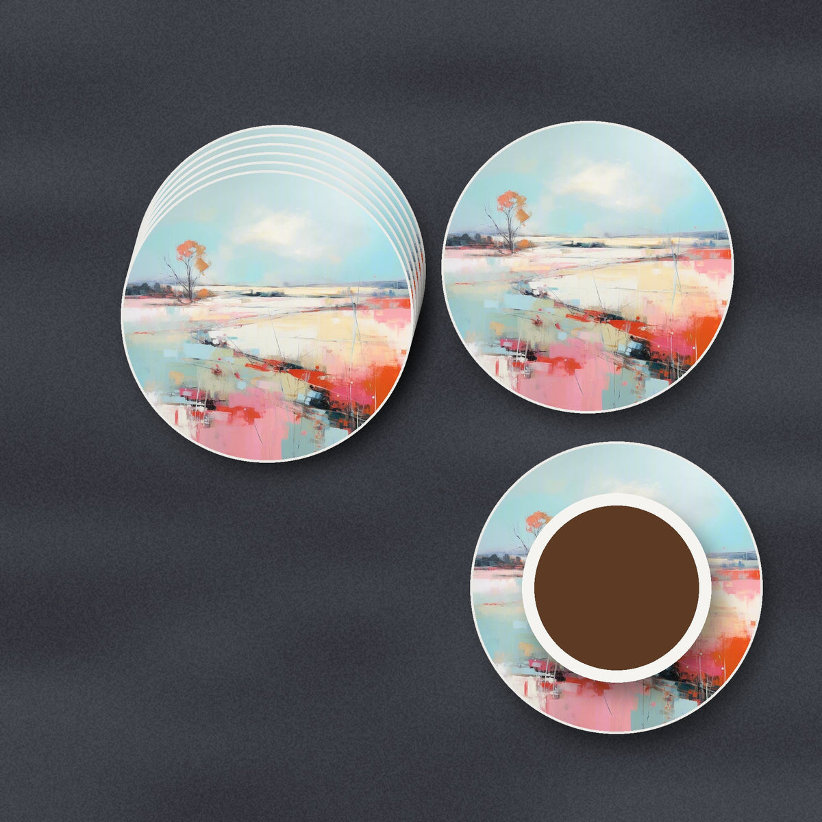 Pastel Abstract Landscape round ceramic coasters stacked on a slate kitchen worktop