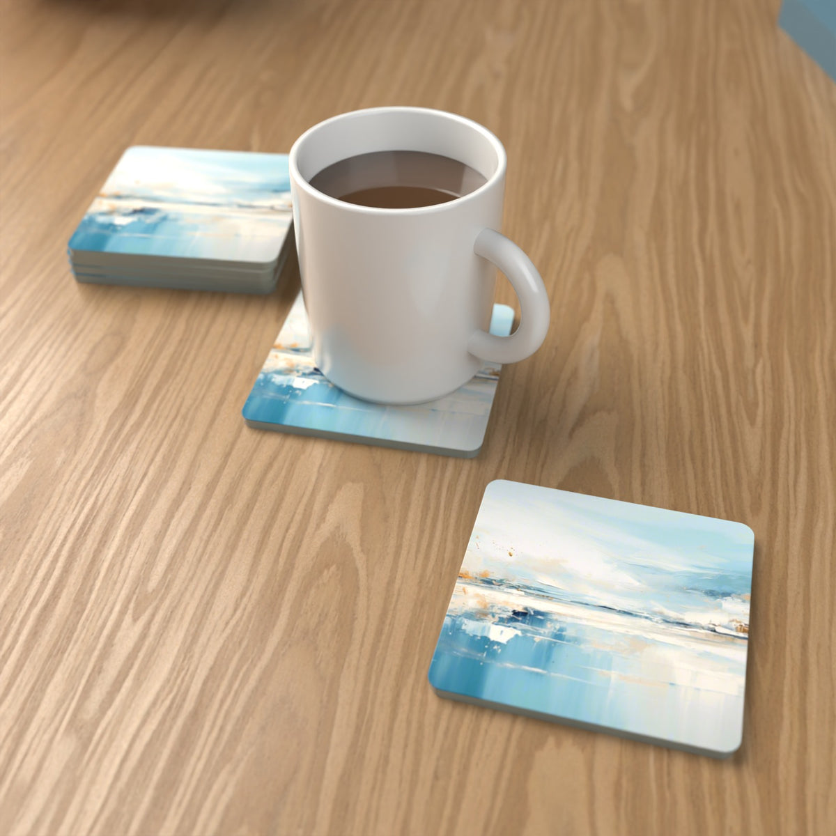 Blue Minimalist Seascape Square Glass Coasters – Set of 6 – lifestyle mockup with a mug of coffee