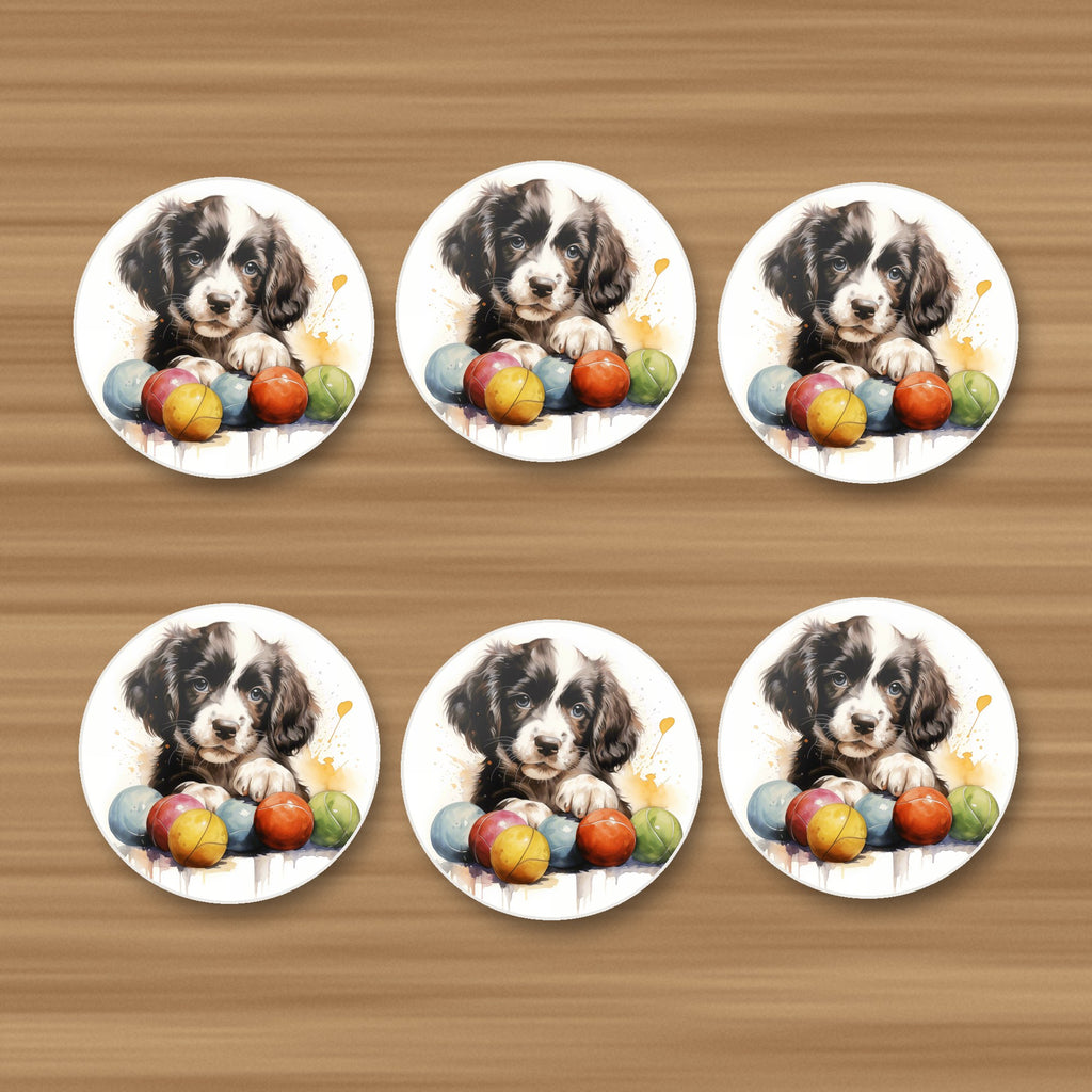 Springer Spaniel Puppy with Balls round ceramic coasters, set of 6, on an oak coffee table